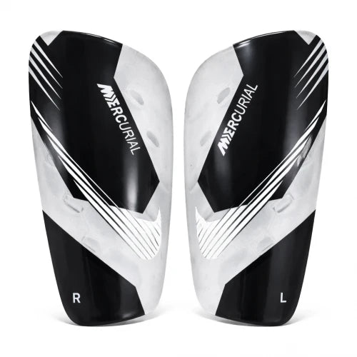 Canilleras gama alta NIKE