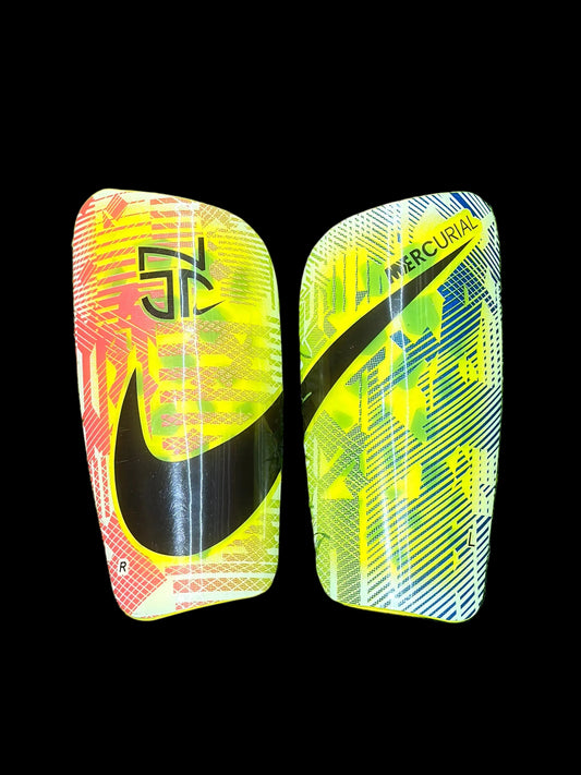 Canilleras gama alta NIKE