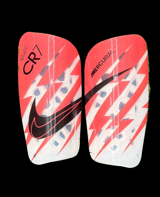 Canilleras gama alta NIKE