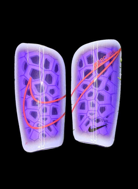 Canilleras gama alta NIKE