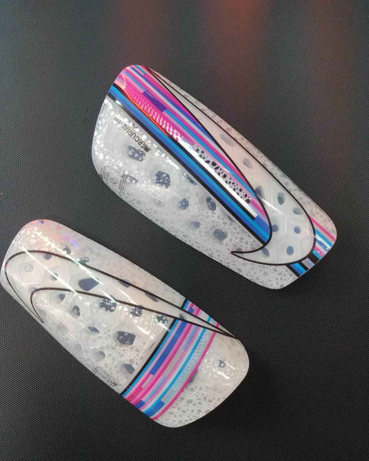 Canilleras gama alta NIKE