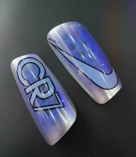 Canilleras gama alta NIKE