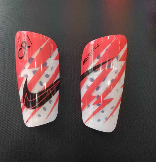 Canilleras gama alta NIKE