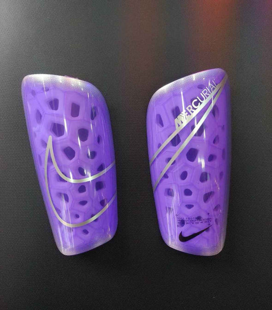 Canilleras gama alta NIKE