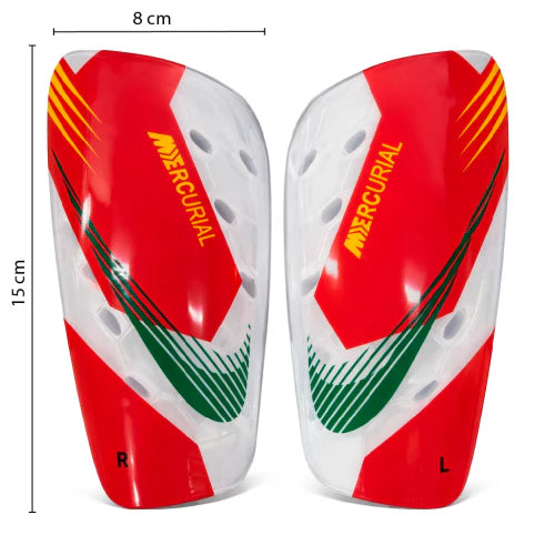 Canilleras gama alta NIKE