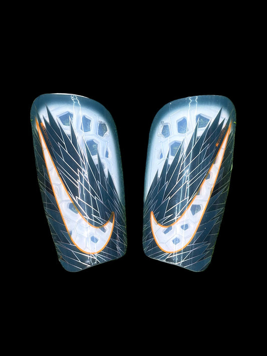 Canilleras gama alta NIKE