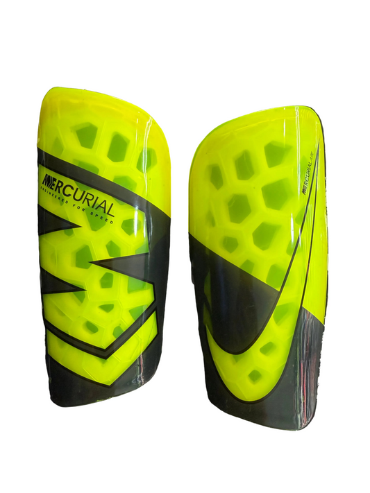 Canilleras gama alta NIKE